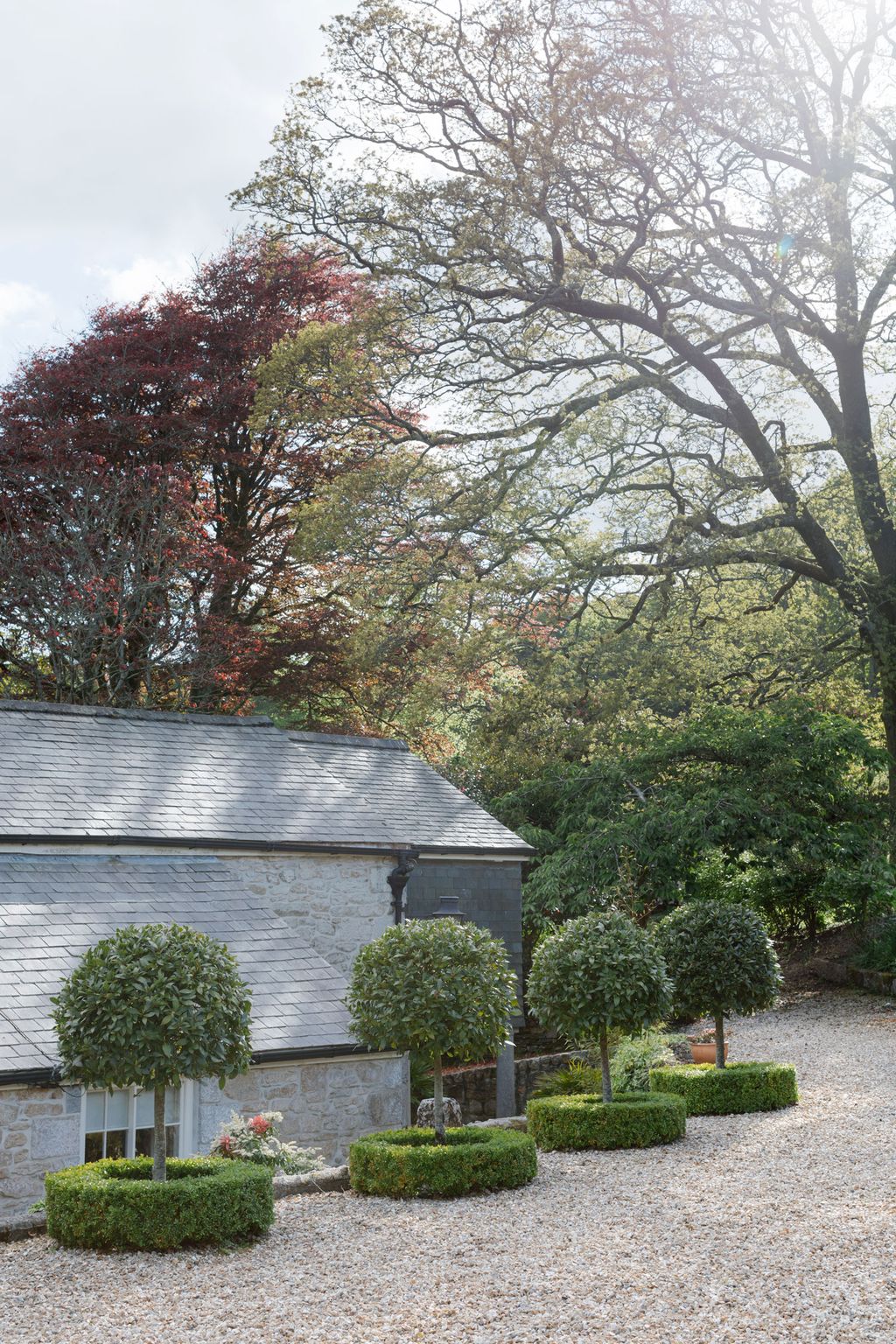 Image may contain Outdoors Cottage Housing House Building Garden Arbour Tree and Plant