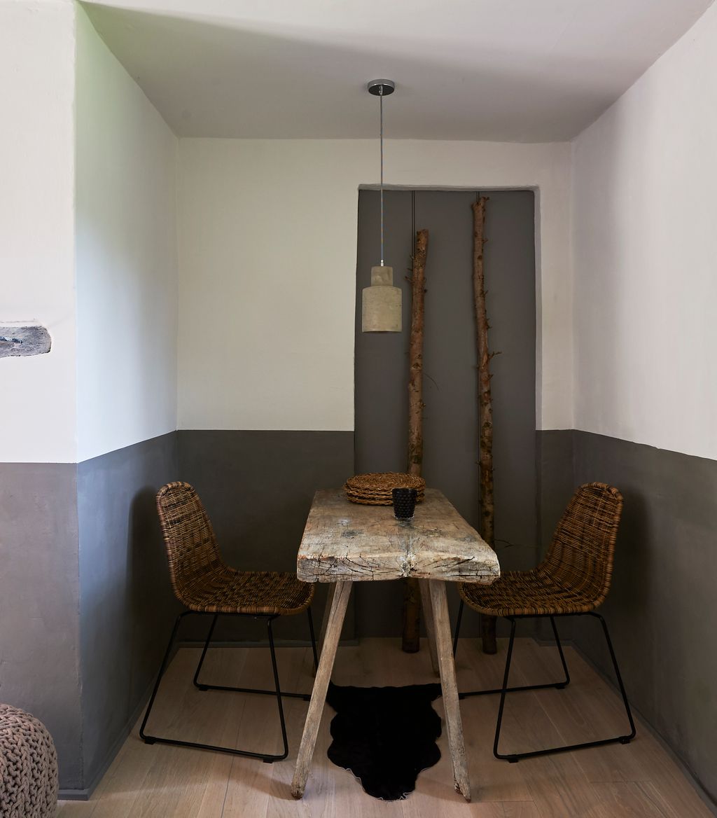 Ancient limed oak beams salvaged from neighbouring Sharrington Hall combine with bleached driftwood floors and...