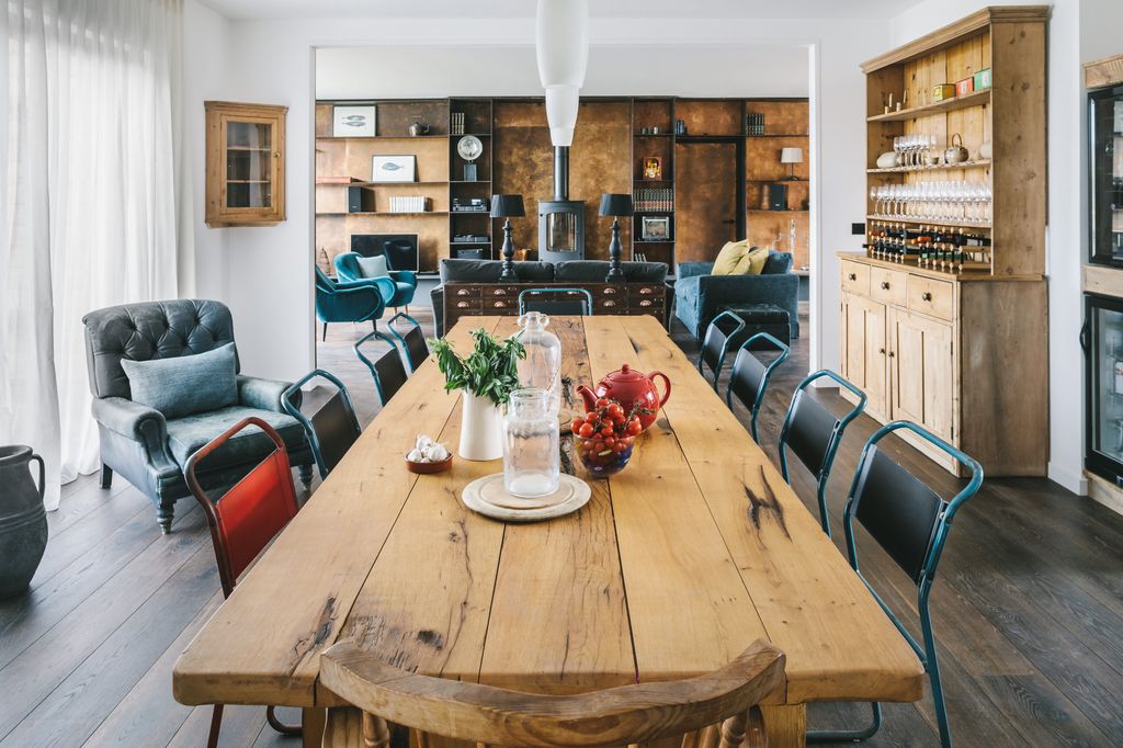 A doubleheight atrium with floor to ceiling windows makes an impact on entrance to this modern beach house overlooking...