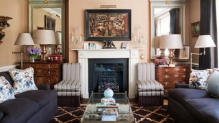 Image may contain Living Room Room Indoors Furniture Interior Design Home Decor Couch Fireplace and Hearth