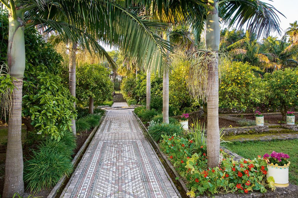 Image may contain Garden Outdoors Arbour Porch and Patio