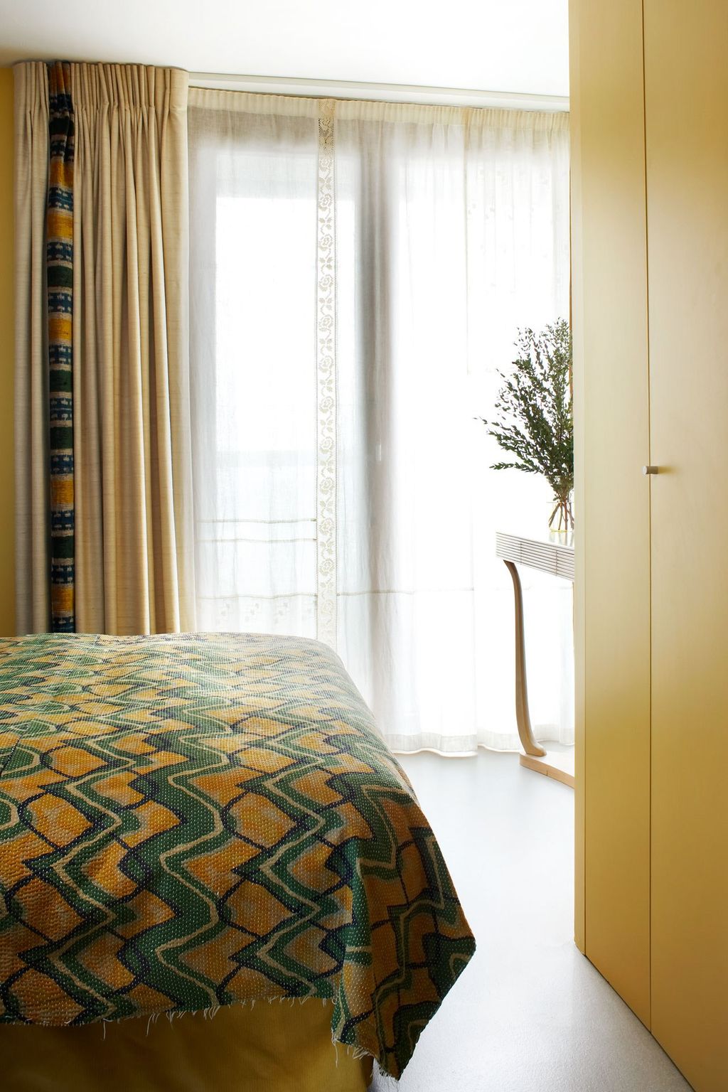 Image may contain Furniture Room Bedroom Indoors Interior Design Home Decor Bed and Rug