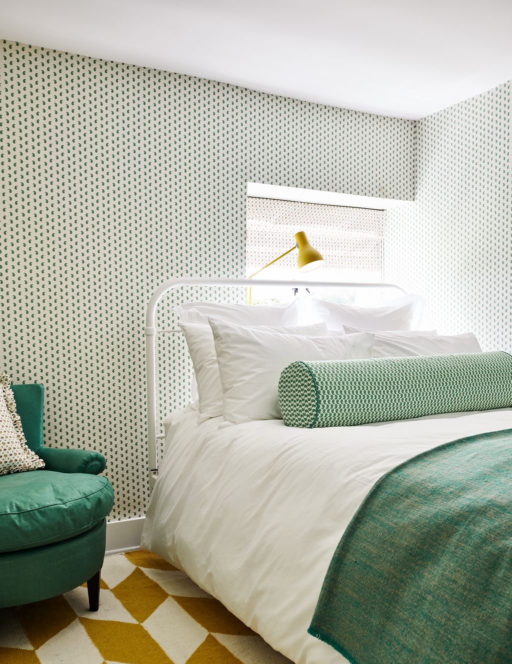 Image may contain Room Bedroom Indoors Furniture Bed Living Room Dorm Room Animal Bird Cushion and Pillow