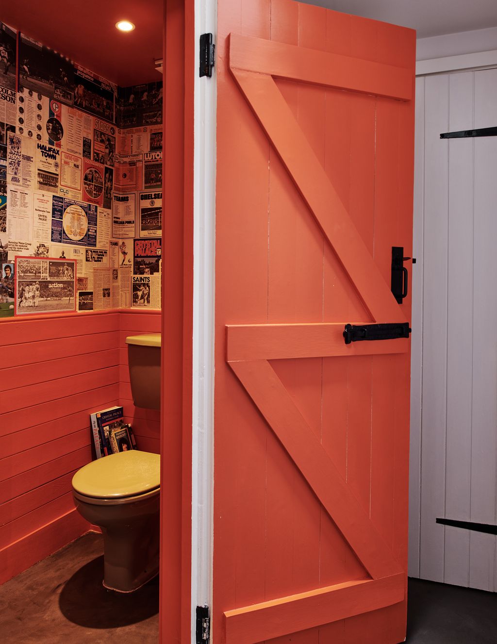 Image may contain Indoors Room Bathroom Toilet and Door