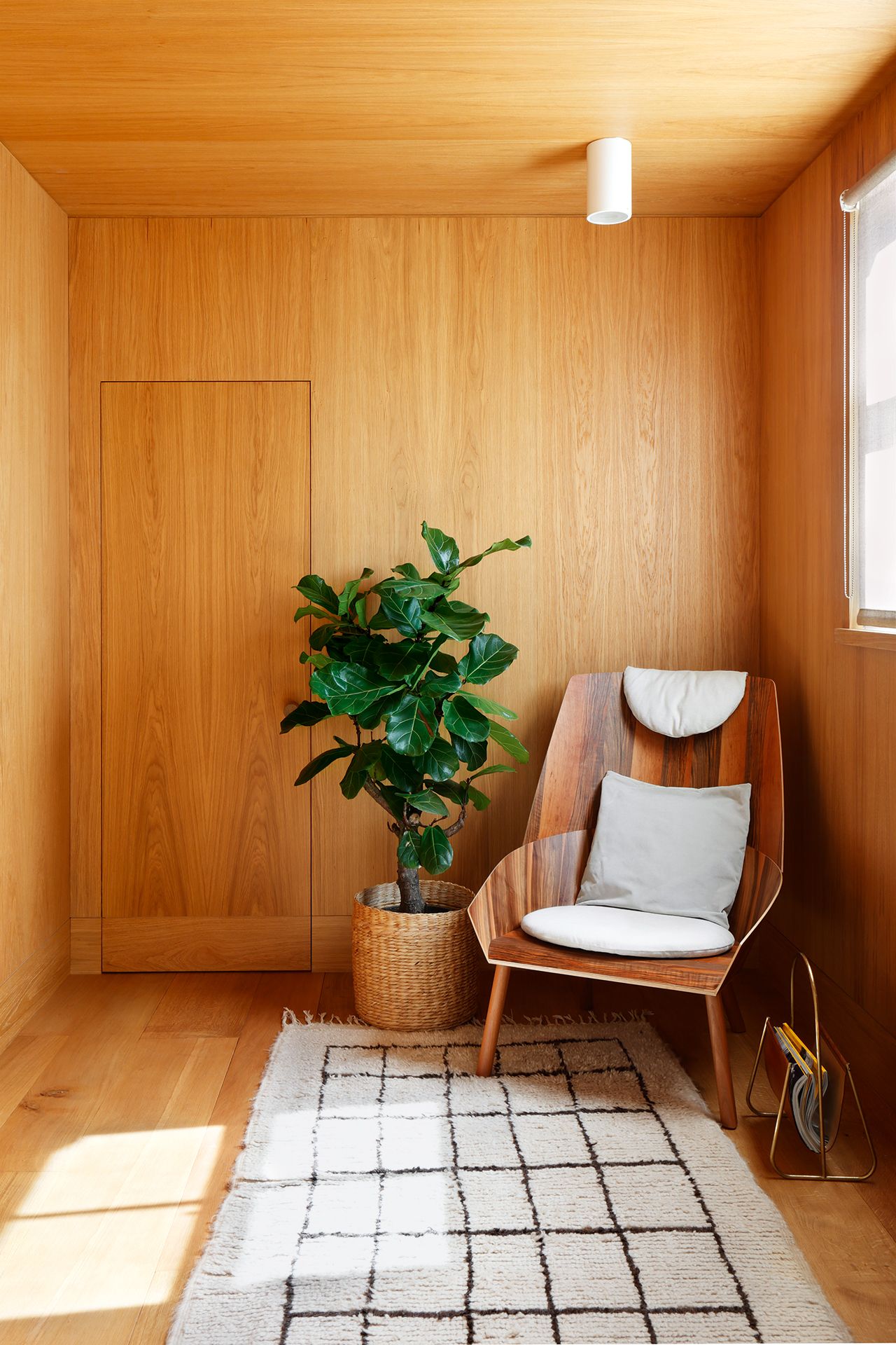 Image may contain Wood Hardwood Flooring Furniture Floor Rug Chair and Plywood
