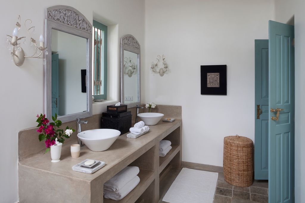 Image may contain Interior Design Indoors Flooring and Double Sink