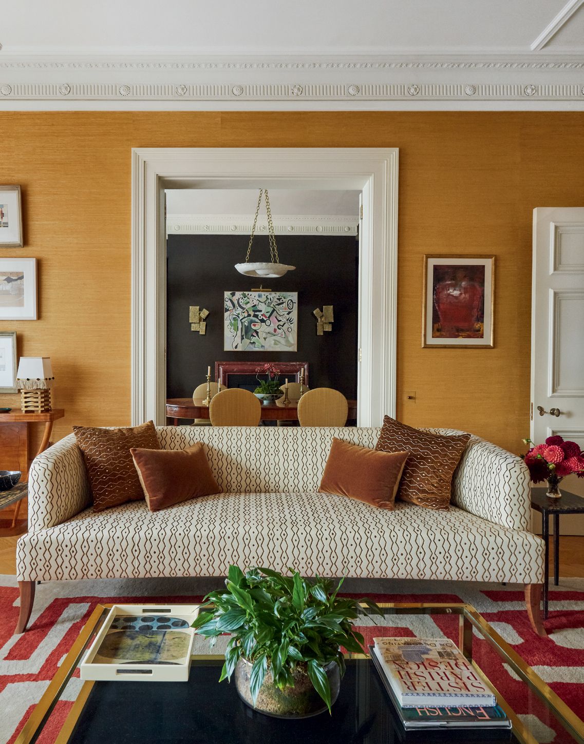 Image may contain Living Room Room Indoors Furniture Couch Table and Rug