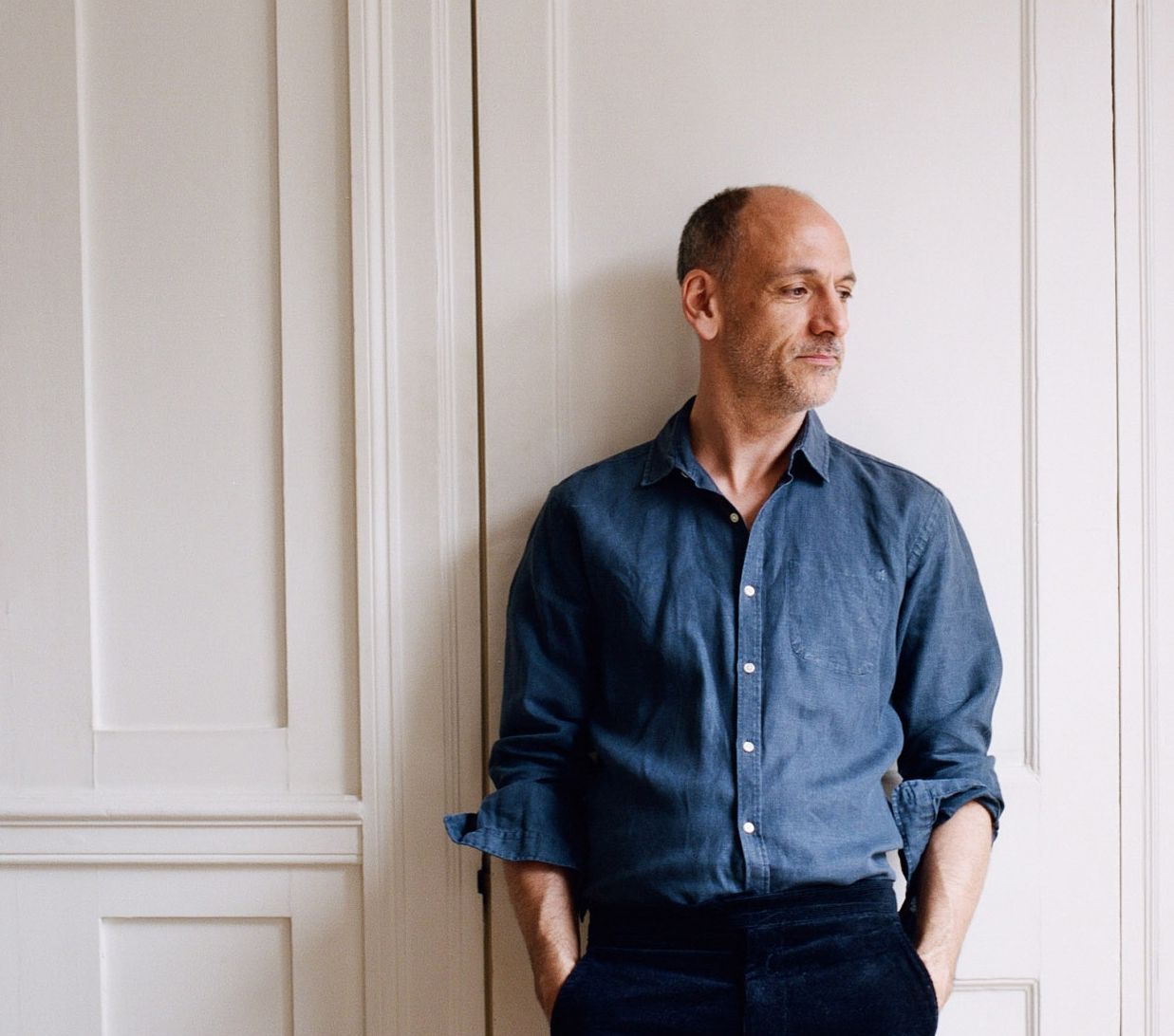 Image may contain Clothing Shirt Apparel Pants Home Decor Human and Person