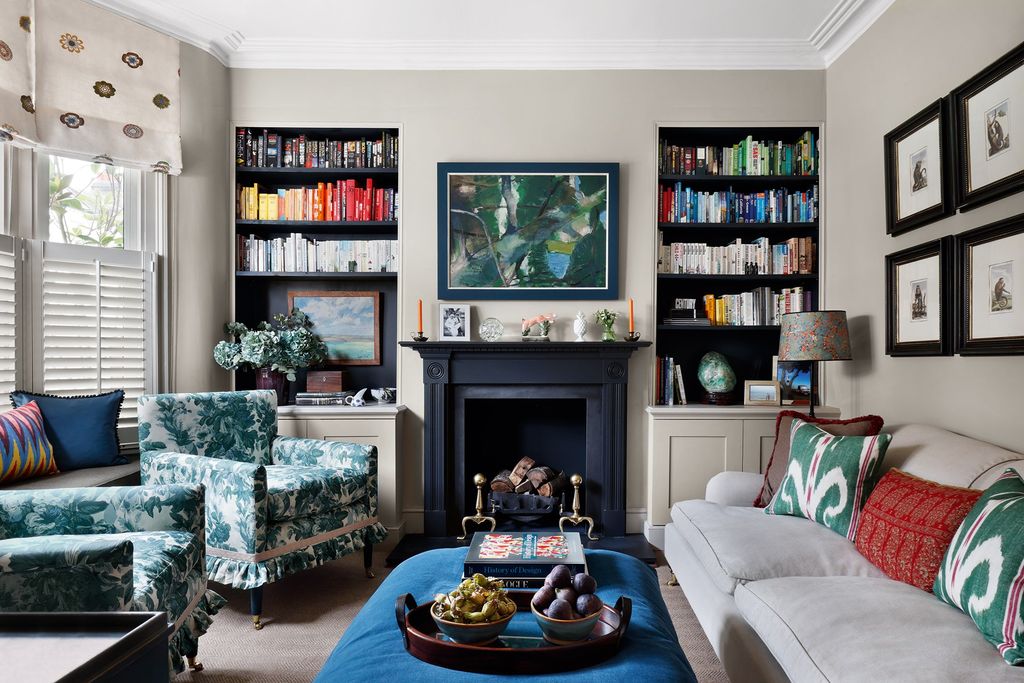 Image may contain Furniture Living Room Room Indoors Interior Design Couch Cushion and Table