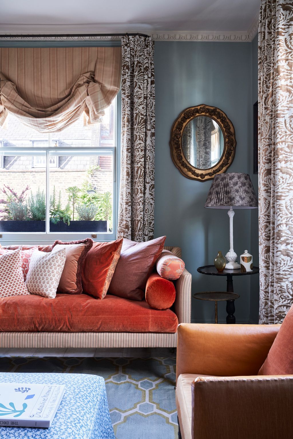 Image may contain Couch Furniture Home Decor Living Room Indoors Room and Cushion