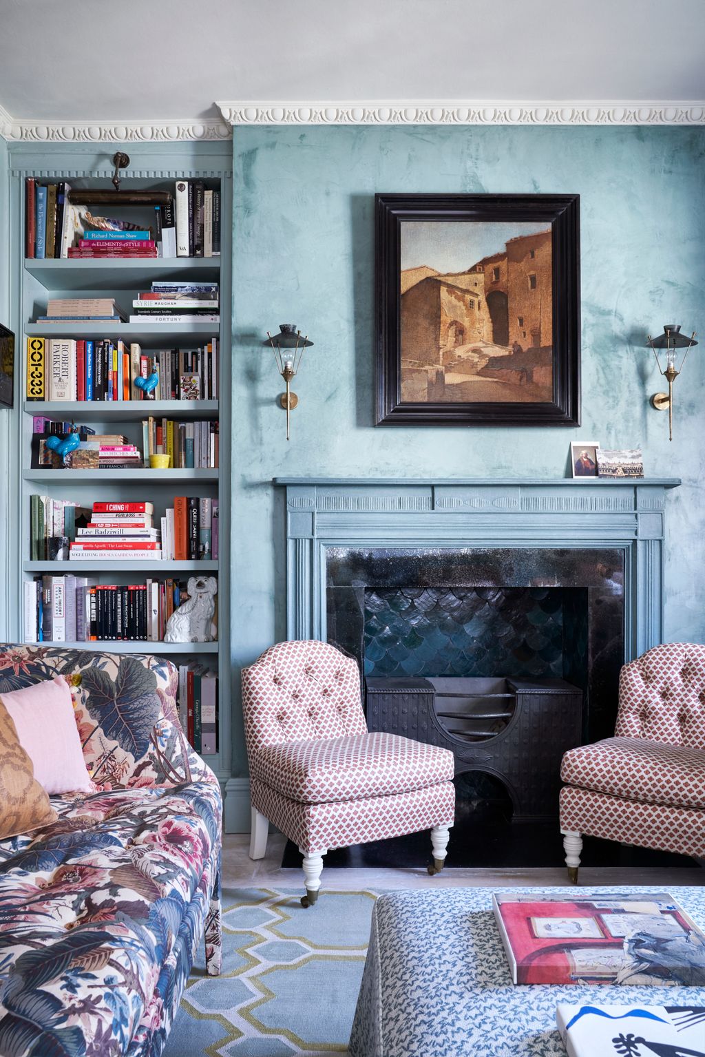 Image may contain Furniture Chair Bookcase Living Room Room Indoors Couch Bed Cushion Interior Design and Shelf