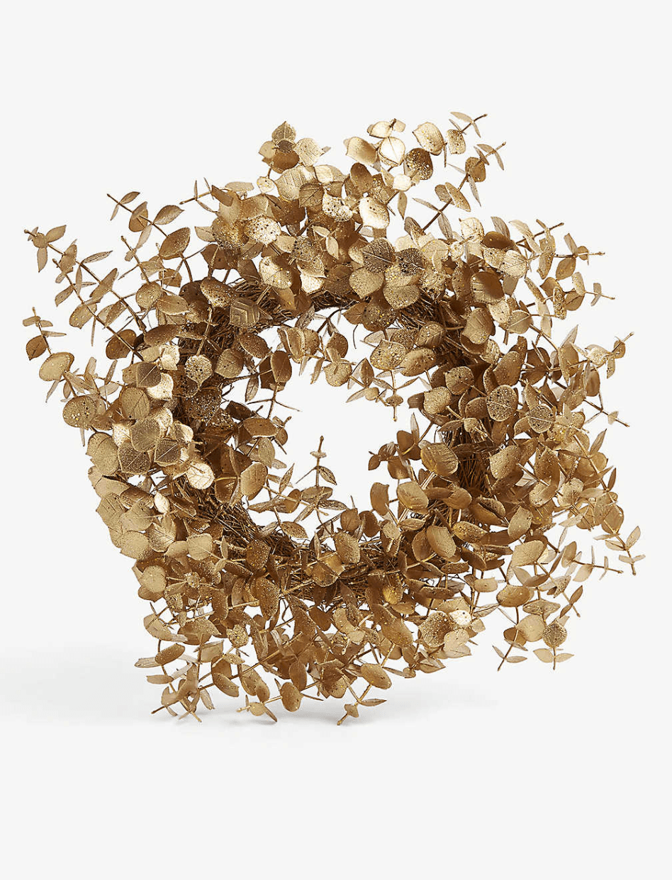 Image may contain Lamp Chandelier and Wreath