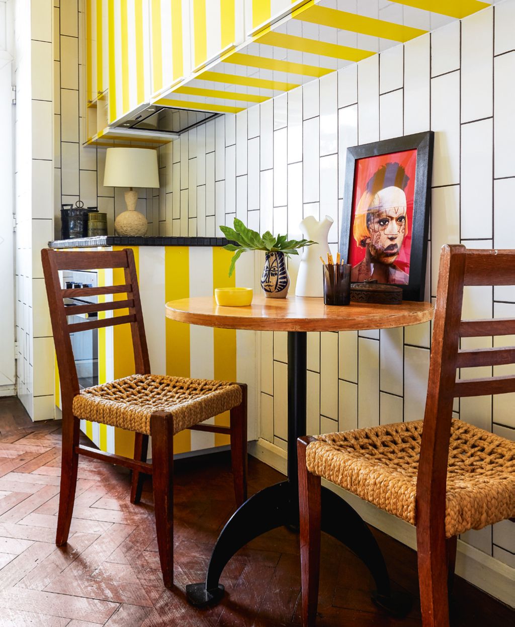 The photograph is from the SelfHybridations series by Orlan. The Fifties oak and abacarope chairs are by AudouxMinet