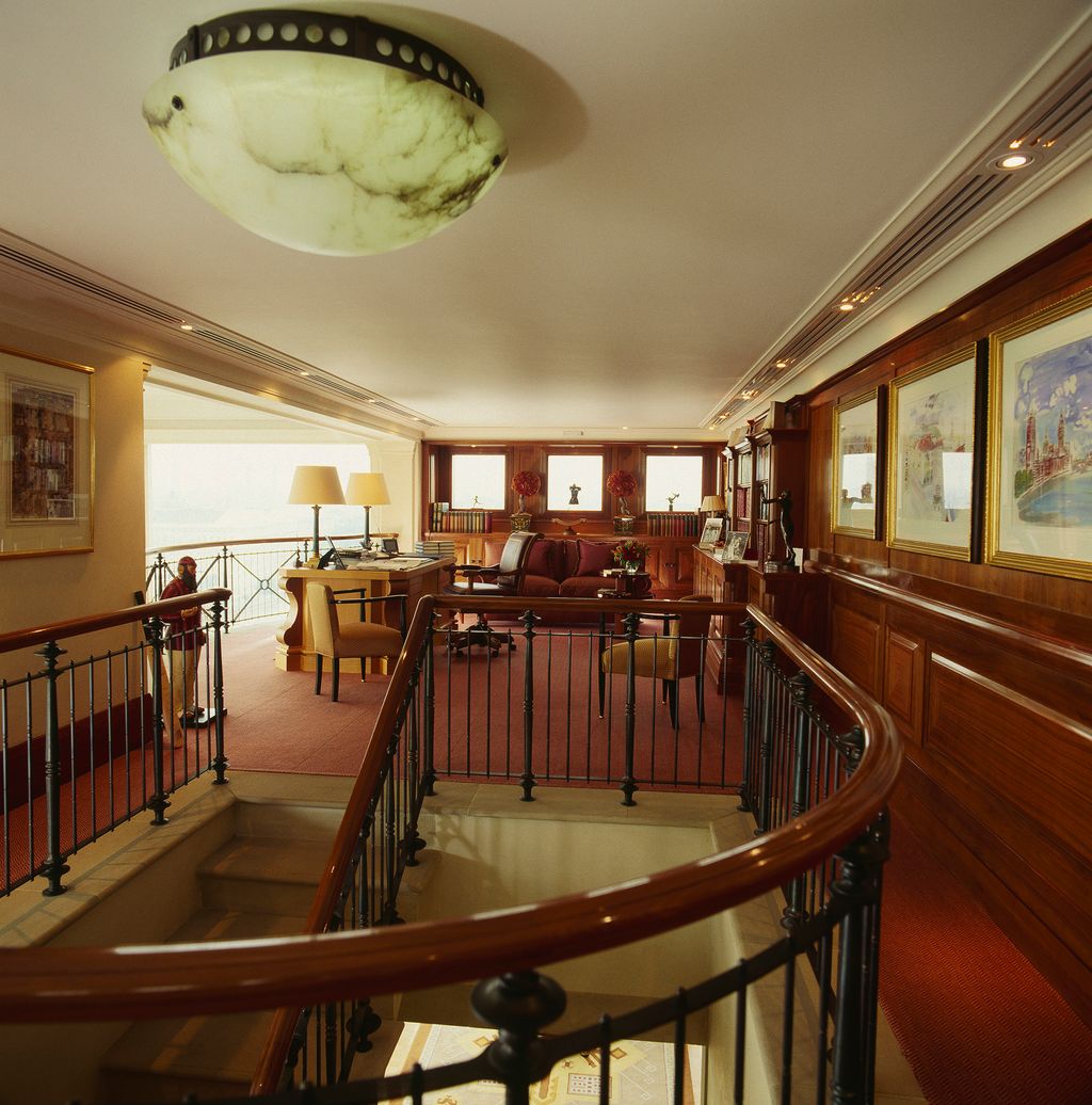 Image may contain Banister Handrail Railing Wood Hardwood Interior Design Indoors Flooring and Floor