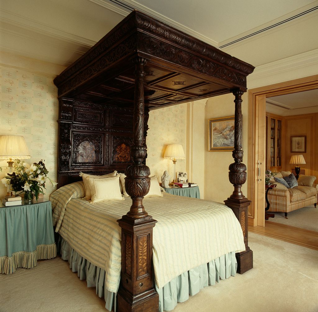 Image may contain Interior Design Indoors Flooring Room Bedroom Furniture Floor Wood Hardwood and Bed