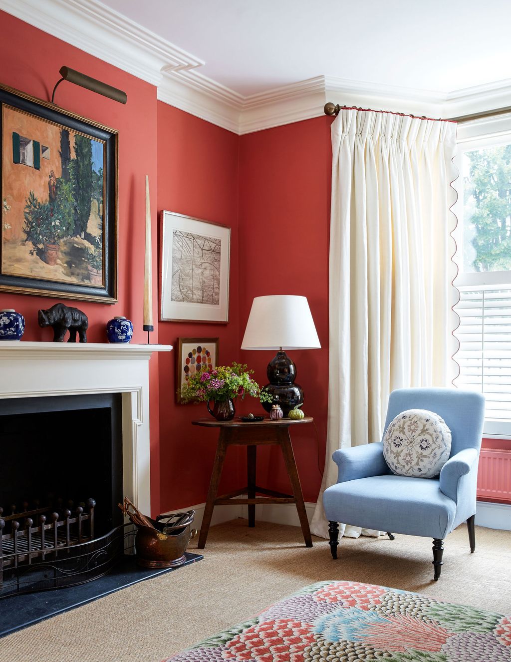 Image may contain Home Decor Indoors Living Room Room Interior Design Furniture and Rug