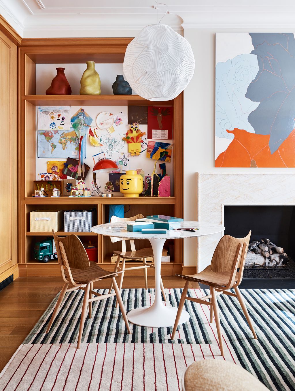 Image may contain Furniture Chair Rug Table Interior Design Indoors Room and Wood