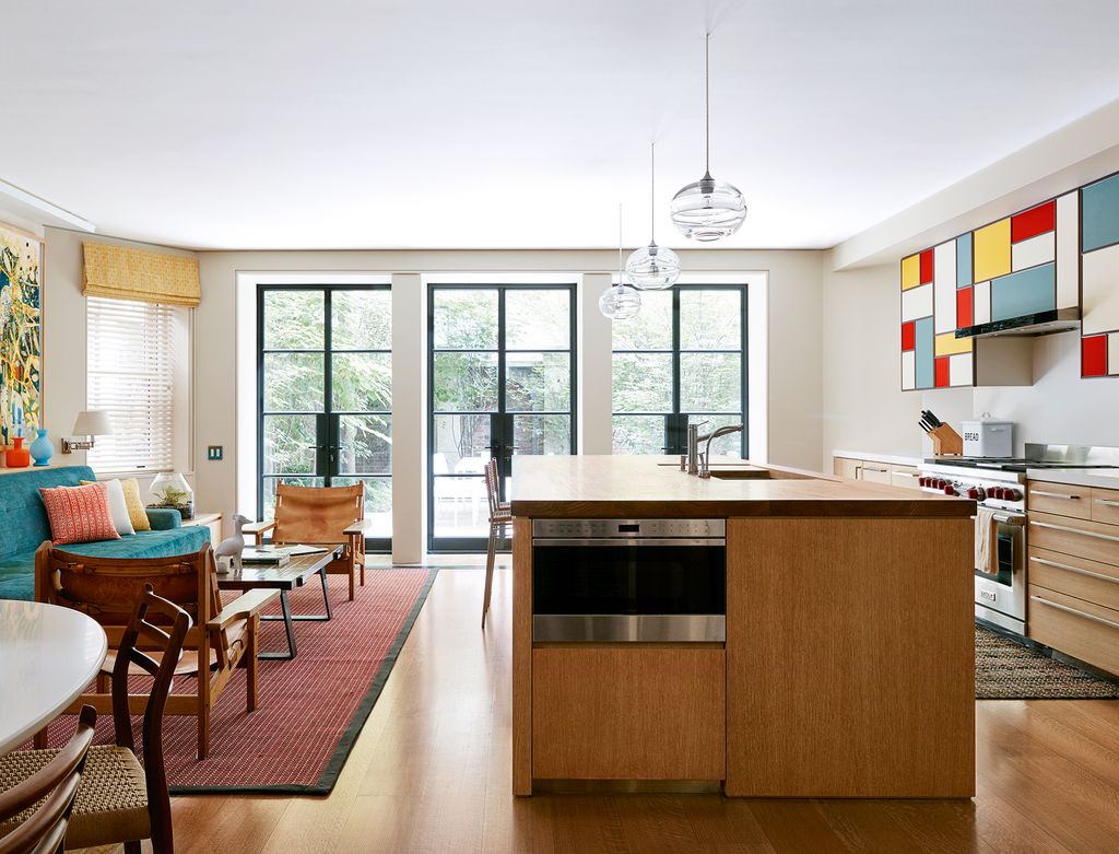 Image may contain Room Indoors Furniture Chair Wood Flooring Interior Design Housing Building and Kitchen