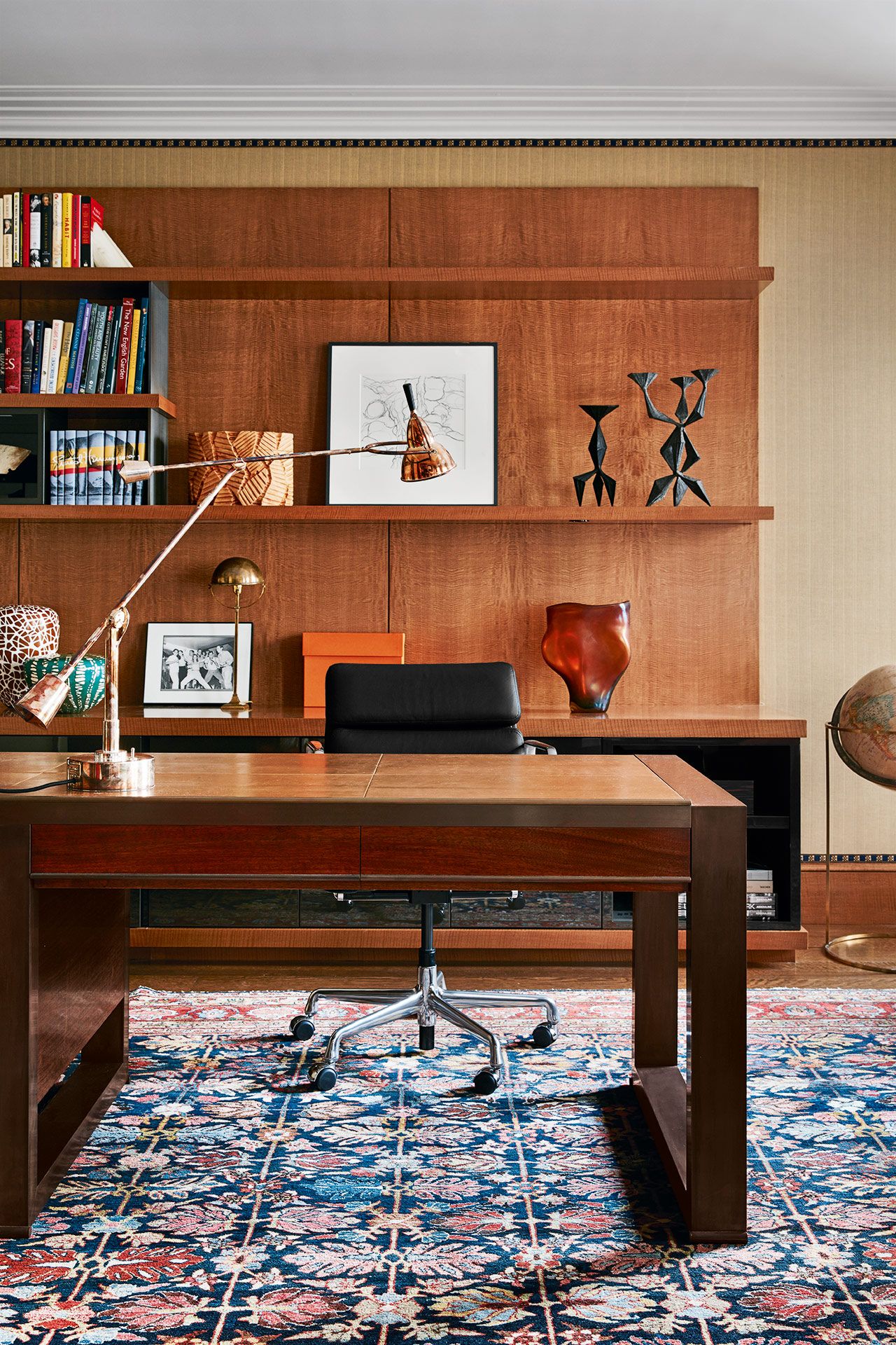 Image may contain Furniture Table Bookcase Shelf Desk Rug Interior Design Indoors and Wood