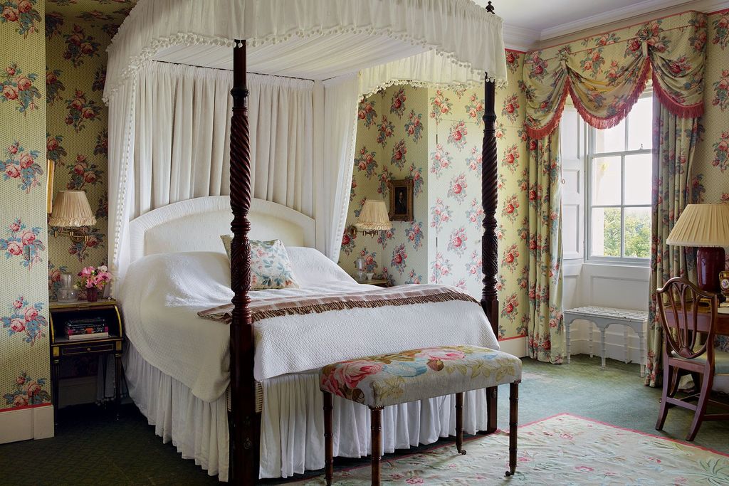 Image may contain Indoors Room Bedroom Furniture Bed Flooring and Interior Design