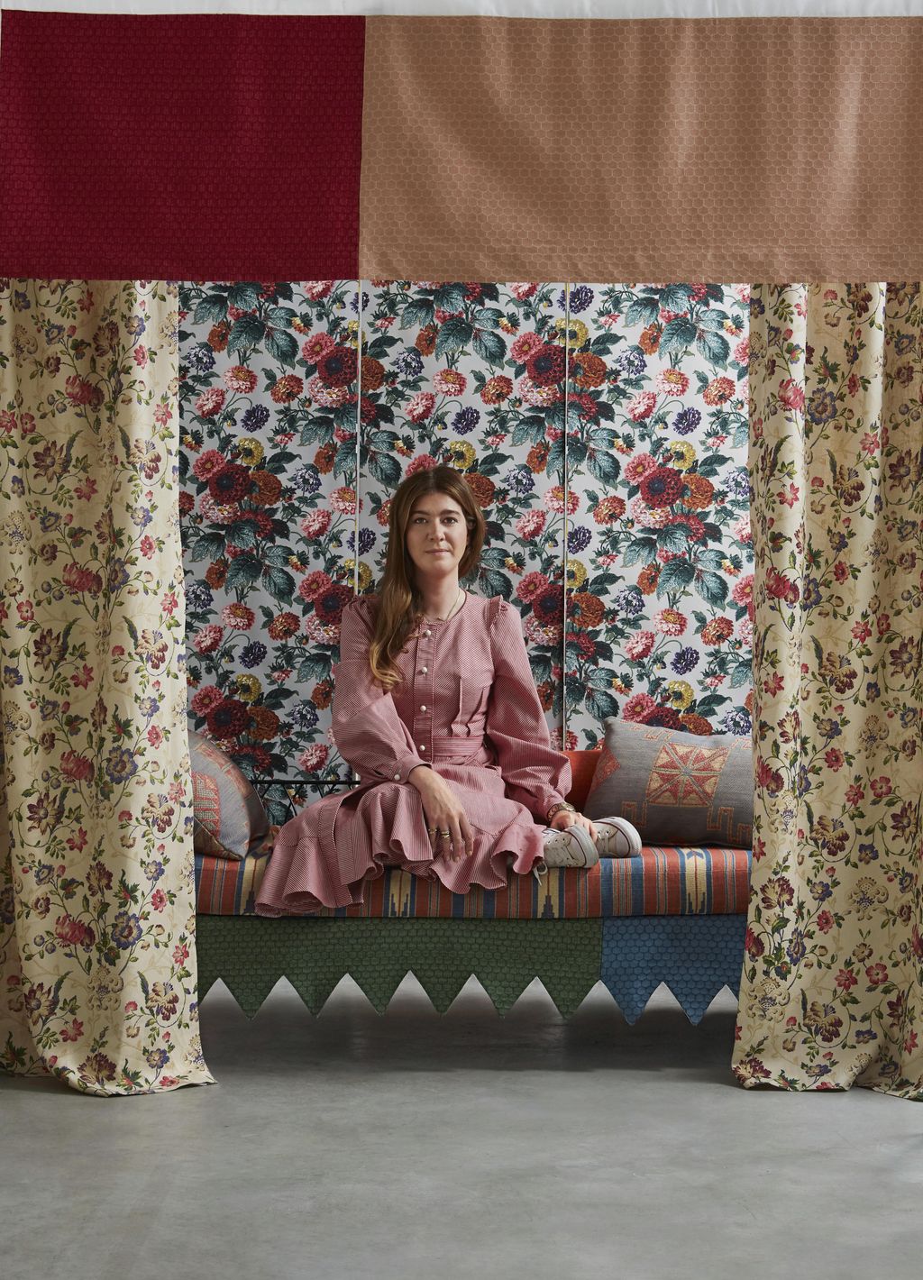 Image may contain Couch Furniture Human Person Living Room Indoors and Room