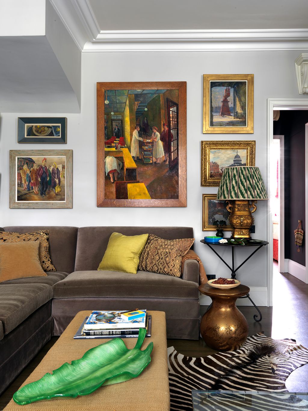 Image may contain Furniture Living Room Room Indoors Couch Interior Design Lamp Table Lamp and Rug