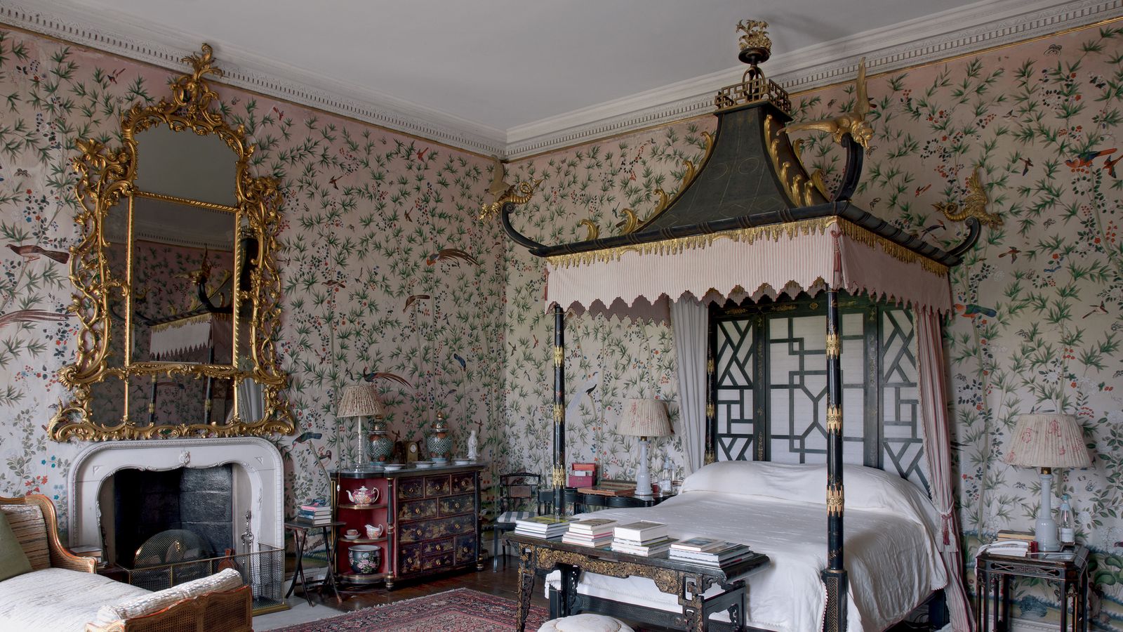 Image may contain: Indoors, Room, Furniture, Interior Design, Living Room, Bedroom, Home Decor, Bed, Fireplace, and Hearth