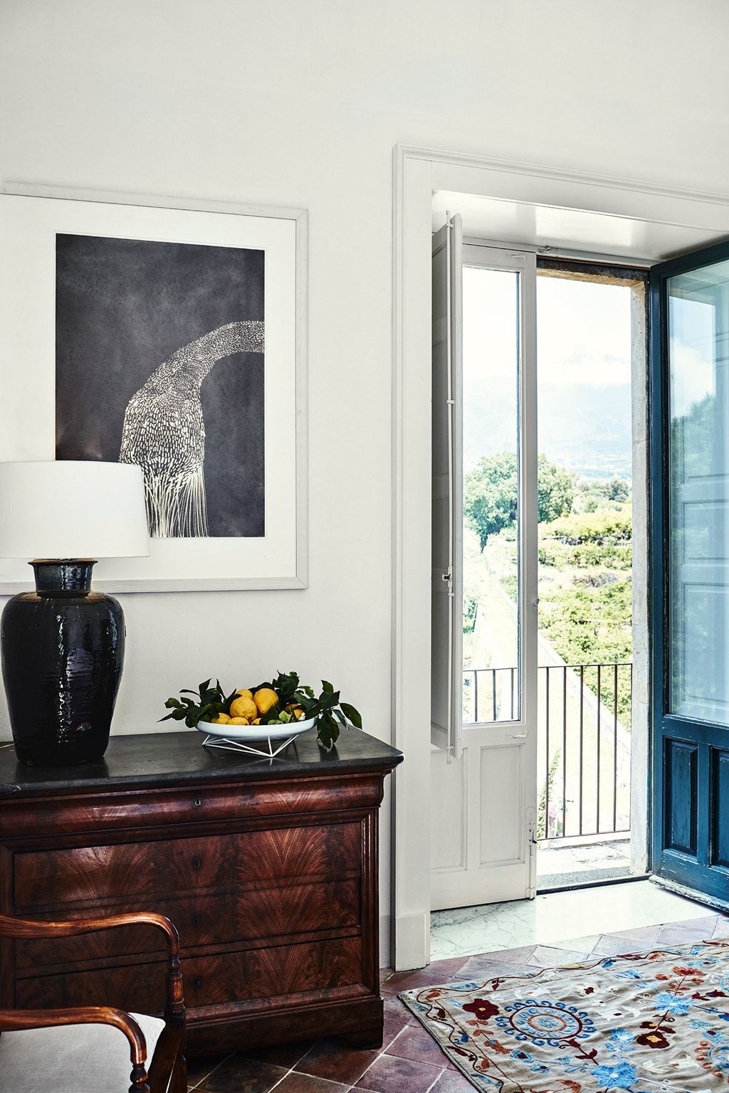 Image may contain Door Furniture and Rug