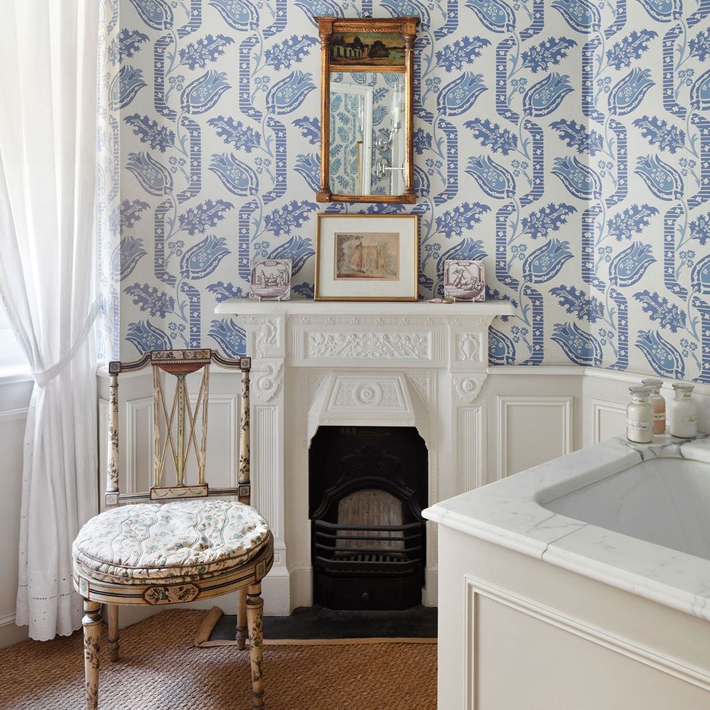 Image may contain Home Decor Indoors Furniture Living Room Room and Fireplace