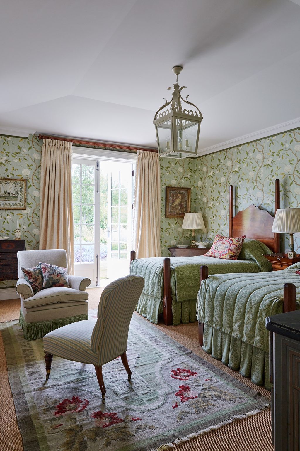 Image may contain Room Indoors Bedroom Furniture Living Room Rug Chair and Lamp