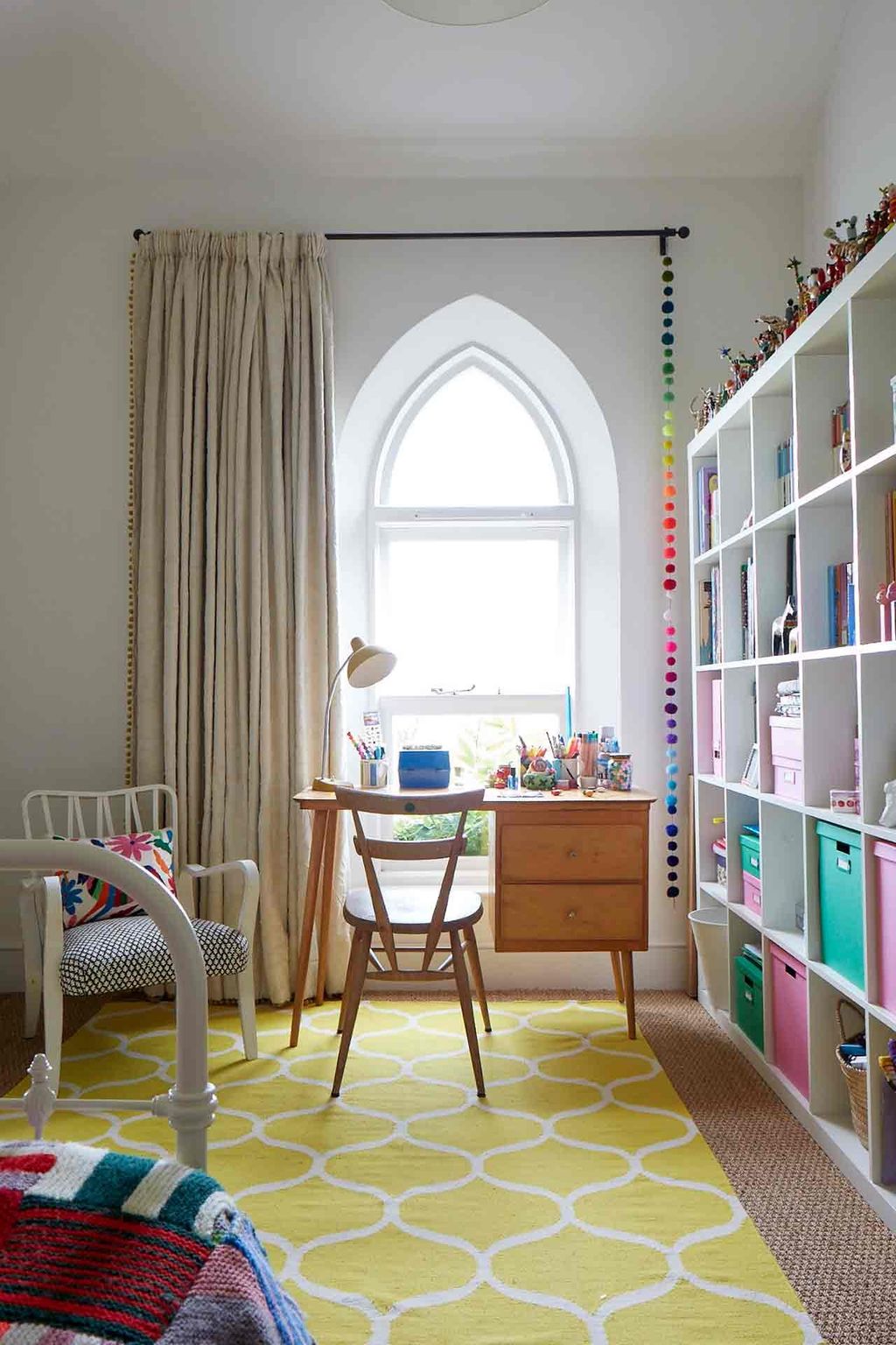 Image may contain Furniture Chair Rug Indoors Room Table and Shelf