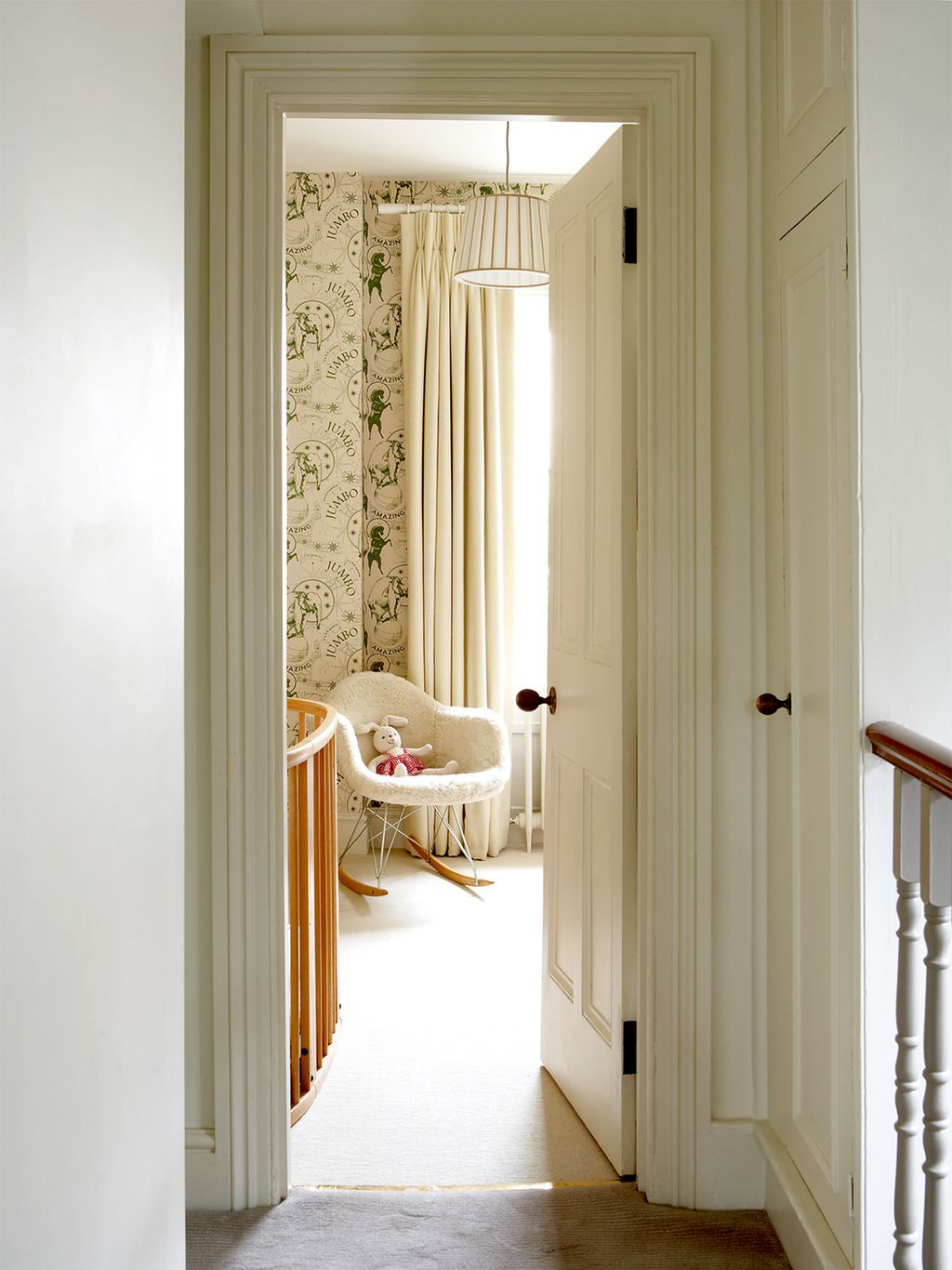 Image may contain Interior Design Indoors Banister Handrail Door Room Flooring Furniture and Railing