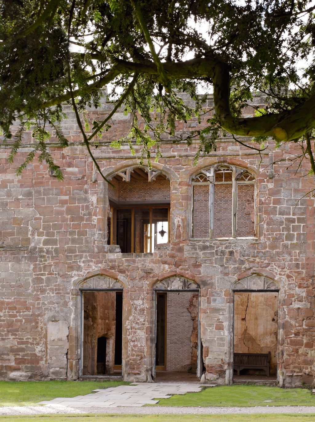 The vertical lights of the new window frames were inspired by the original Gothic mullions.