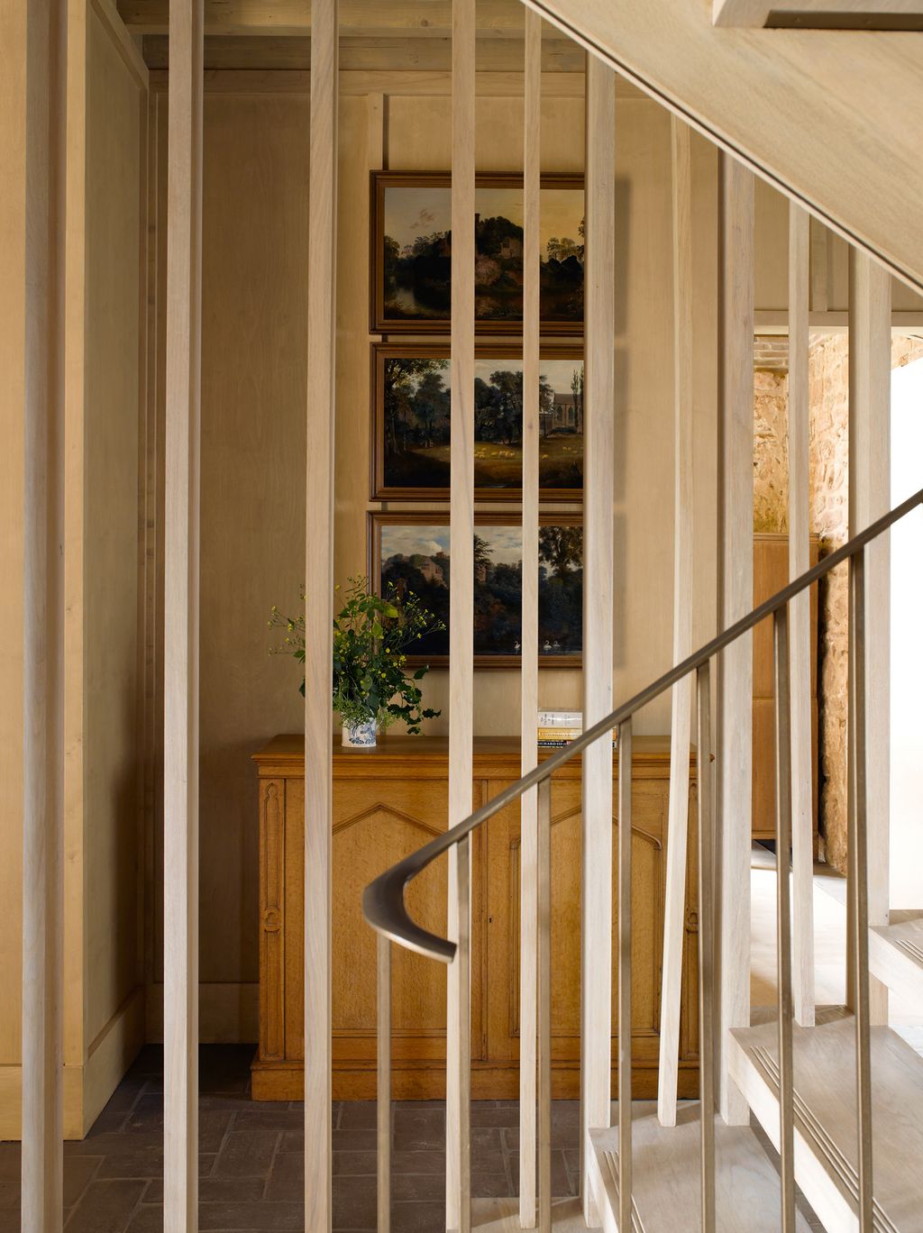 Image may contain Banister Handrail Interior Design Indoors Railing and Staircase