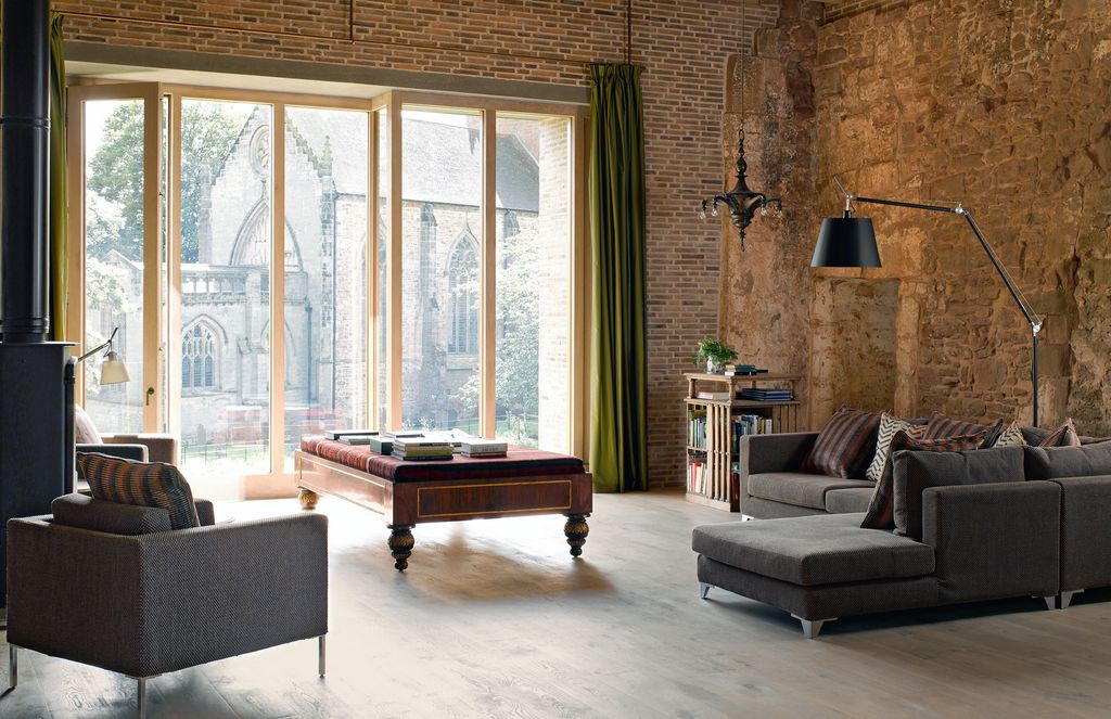 Image may contain Furniture Room Indoors Living Room Table Interior Design and Couch