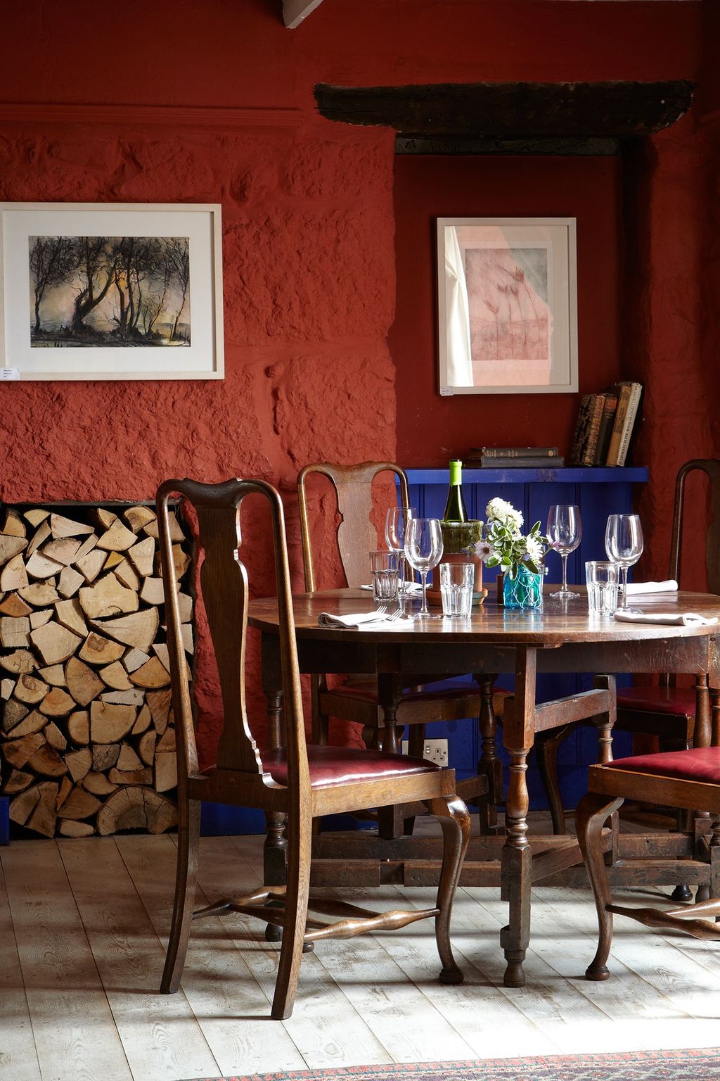 Image may contain Furniture Chair Dining Table Table Wood Hardwood Room and Indoors