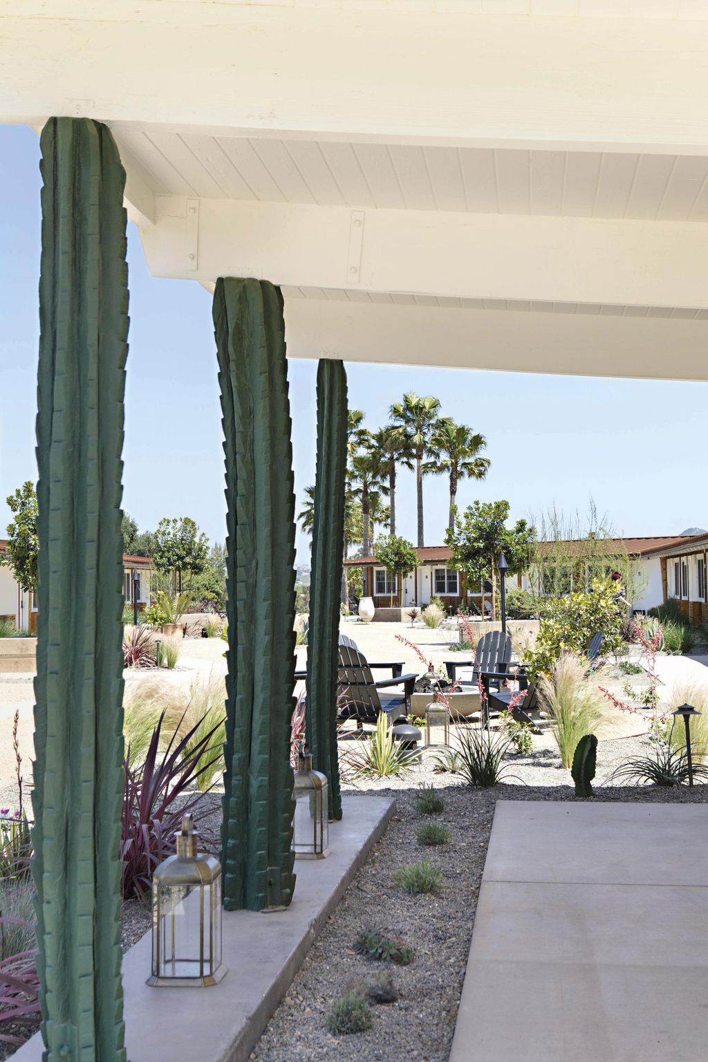 Faux cactus columns make striking supports at the entrance to Skyviews Norman.