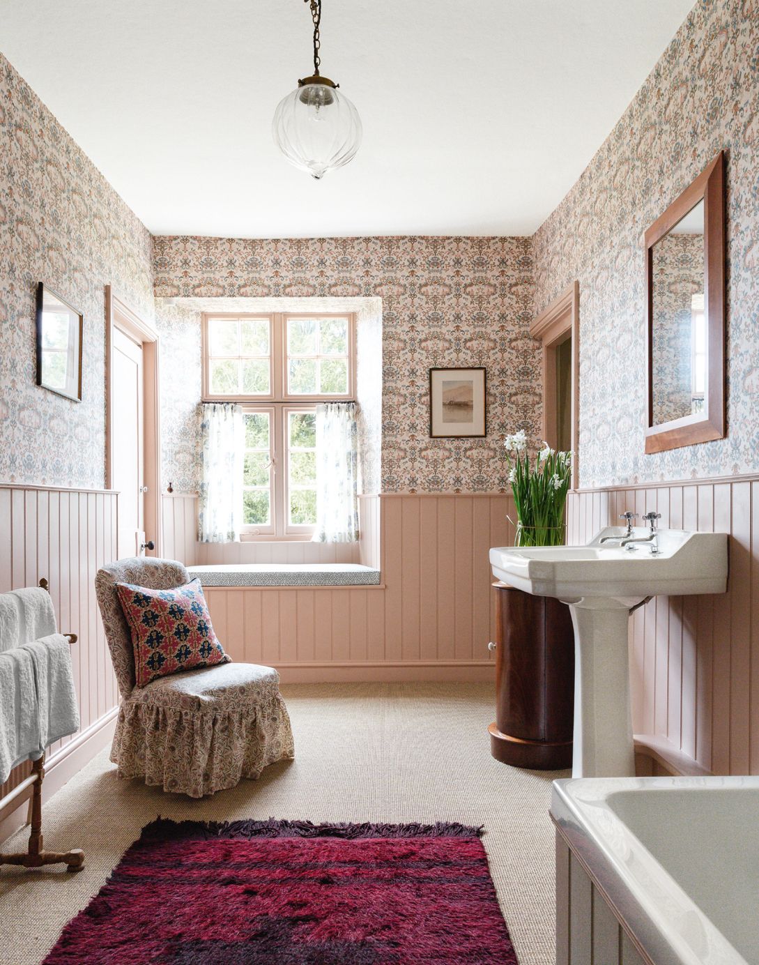 Antique Gold sisal from Crucial Trading covers the floor of this bathroom in a Carlos Garcia Norfolk manor house