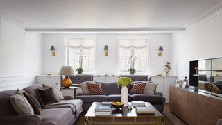 Image may contain Furniture Living Room Room Indoors Table Coffee Table Couch Interior Design Flooring and Rug