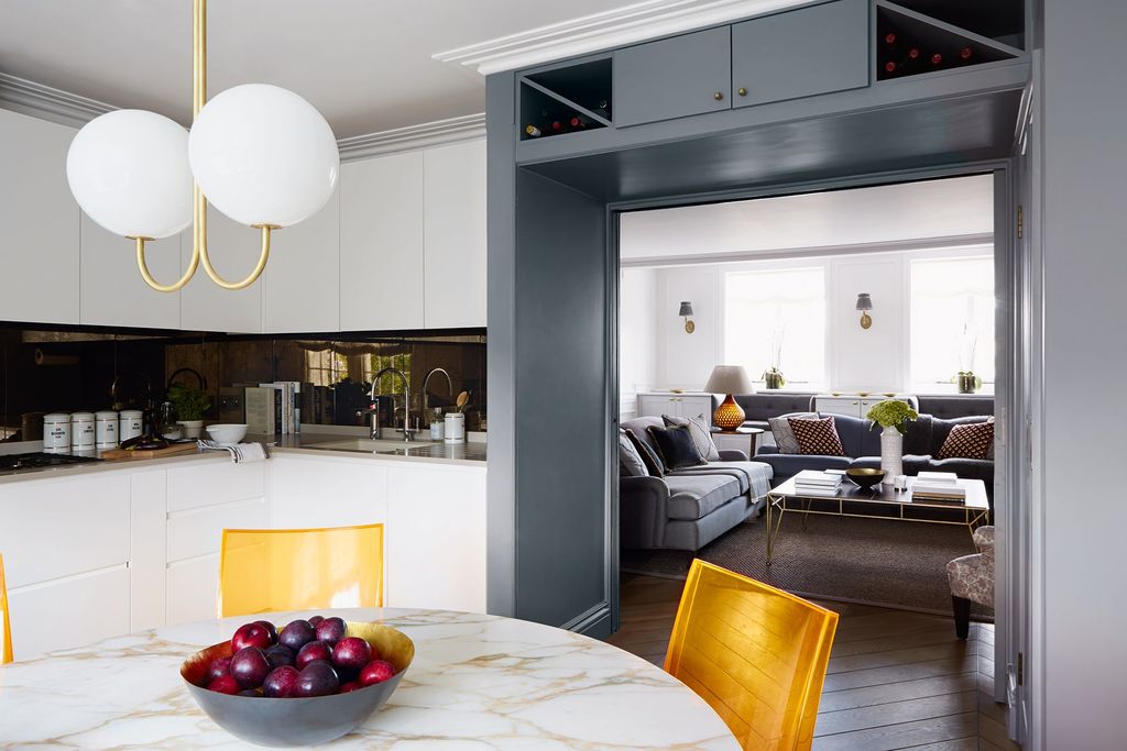 Image may contain Interior Design Indoors Furniture Room Living Room Table Plant and Wood