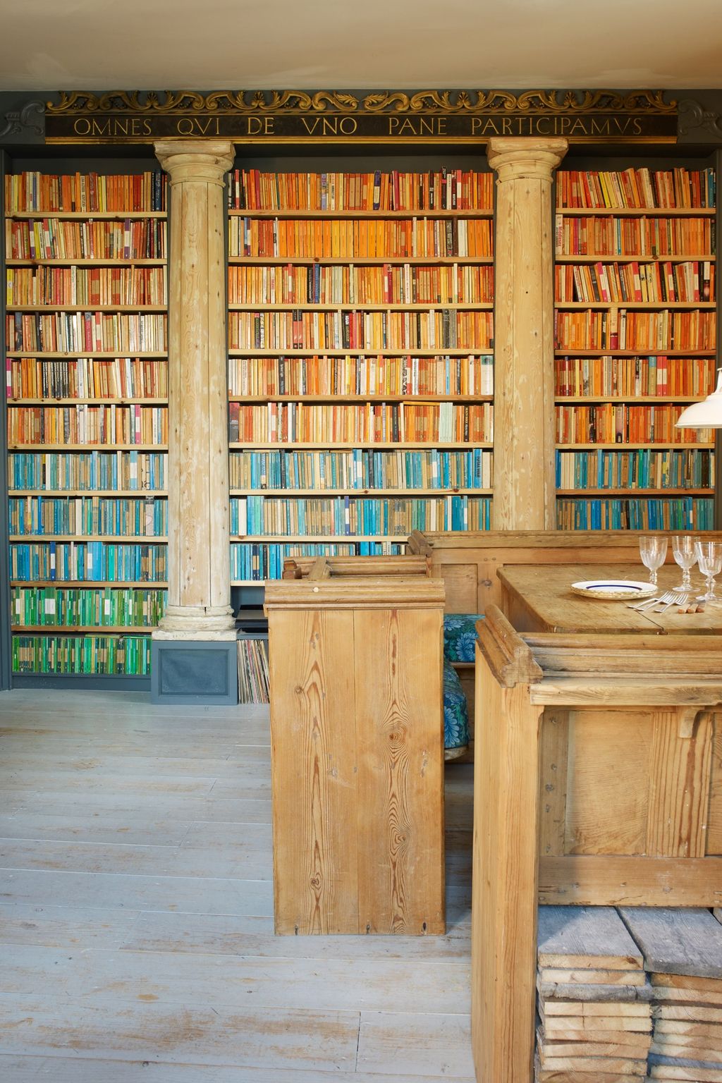 Image may contain Furniture Indoors Room Library Book Wood Interior Design and Bookcase