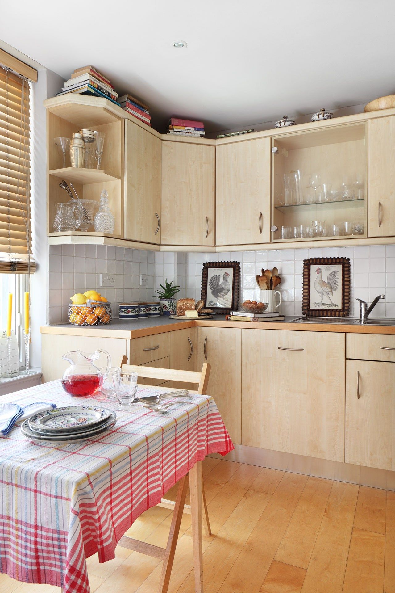 Image may contain Furniture Room Indoors Home Decor Kitchen Island Interior Design Kitchen and Wood