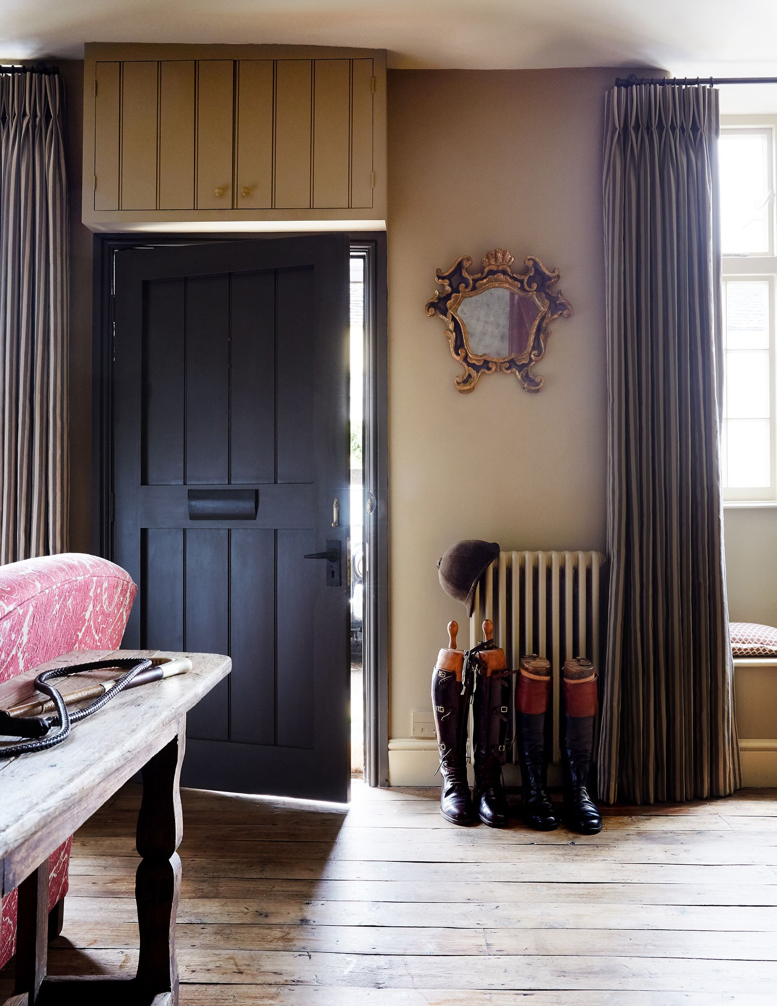 Painted in ‘Salvador by Paint amp Paper Library the front door opens into the sitting room which encompasses the former...