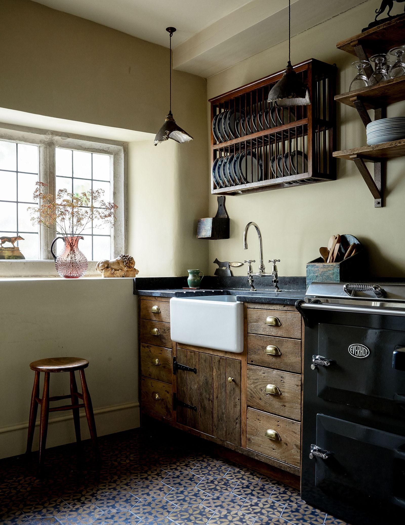 Image may contain Furniture Indoors Room Bar Stool Sink Faucet and Kitchen