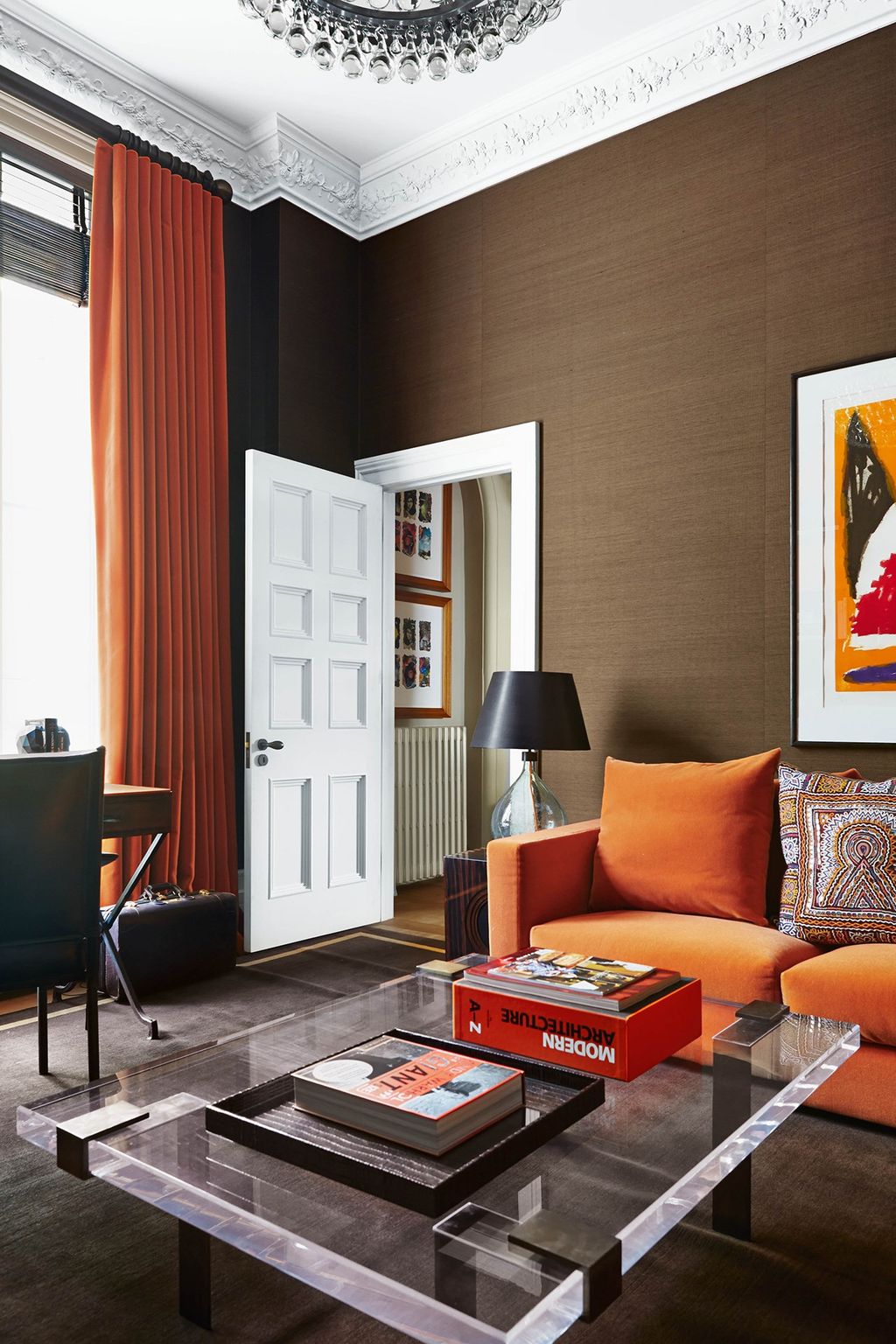 Image may contain Furniture Living Room Indoors Room Couch Table Interior Design Rug and Coffee Table