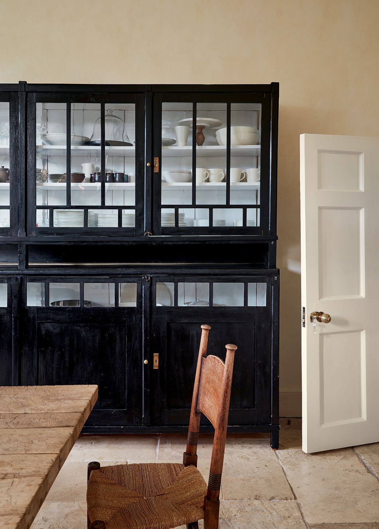 In the kitchen of this tranquil 17thcentury London house designed by Rose Uniacke sits this 20thcentury Swedish cupboard.