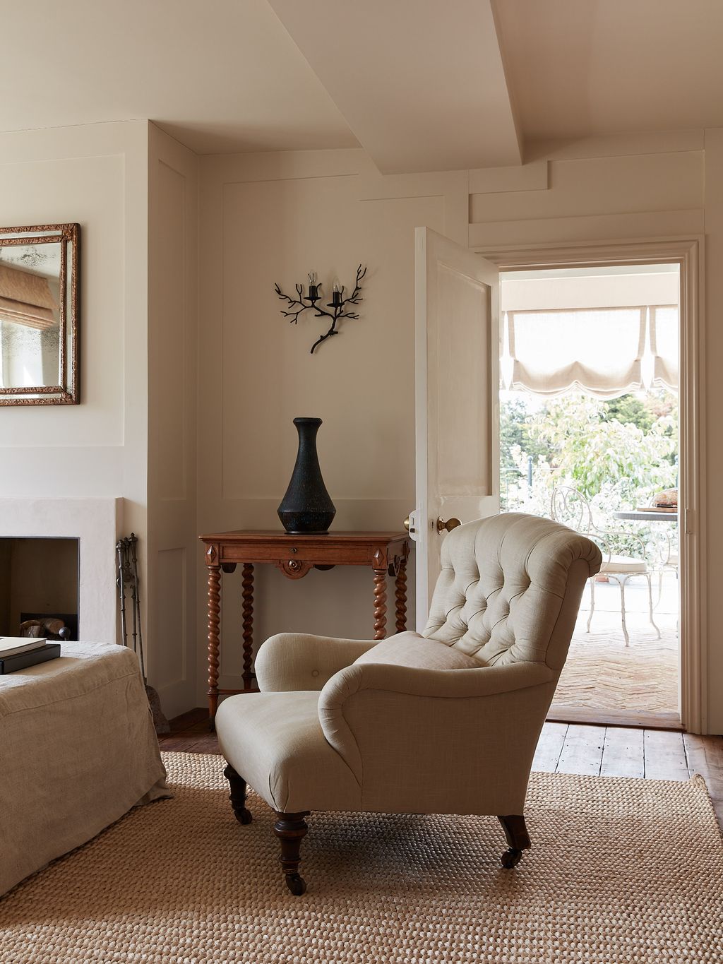 Image may contain Furniture Living Room Indoors Room Home Decor Interior Design and Couch