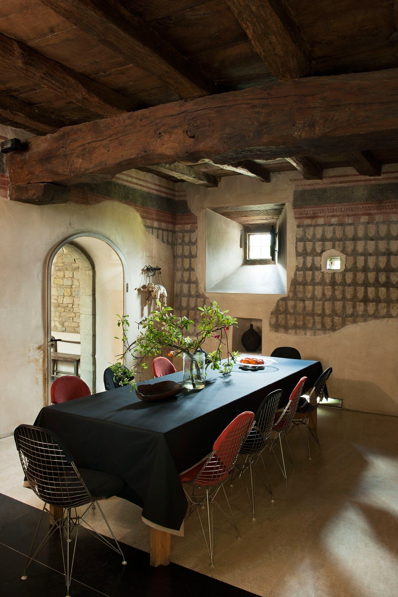 Image may contain Furniture Chair Room Indoors Interior Design Dining Room Flooring Living Room and Dining Table