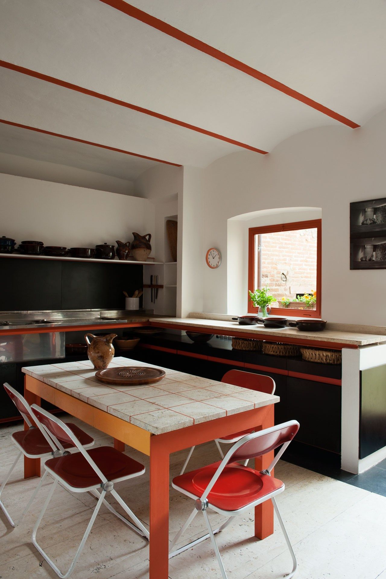 Image may contain Furniture Chair Table Indoors Living Room Room Interior Design Kitchen Island and Dining Table