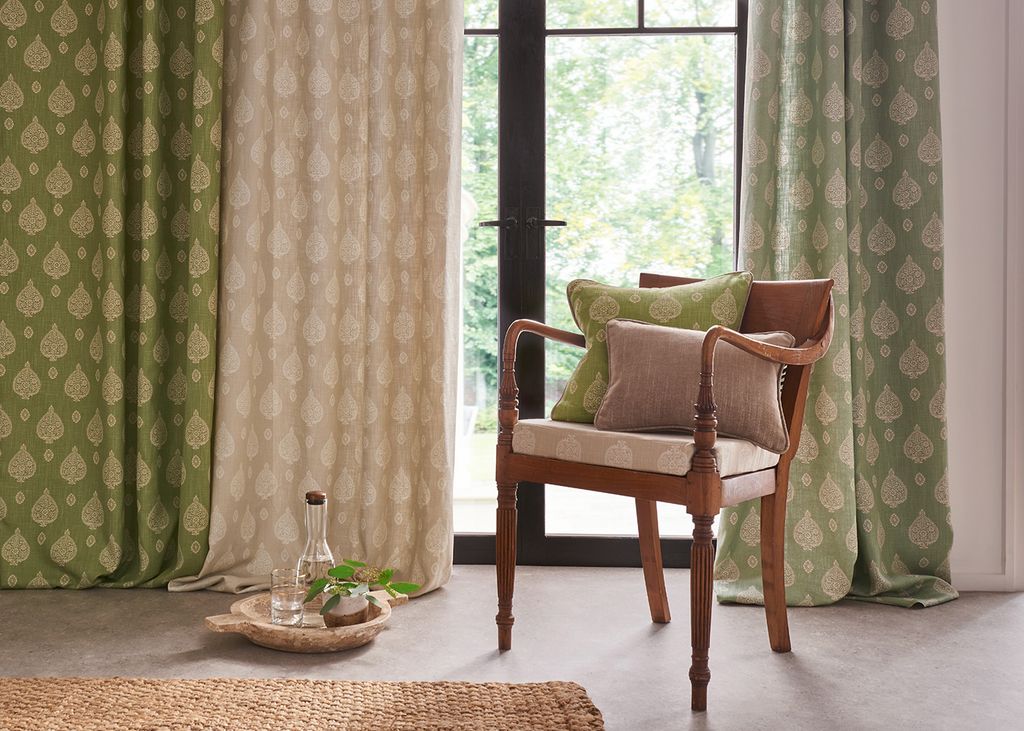 Image may contain Home Decor Furniture Chair Interior Design Indoors and Linen